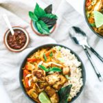 Bowl of red curry with tofu.