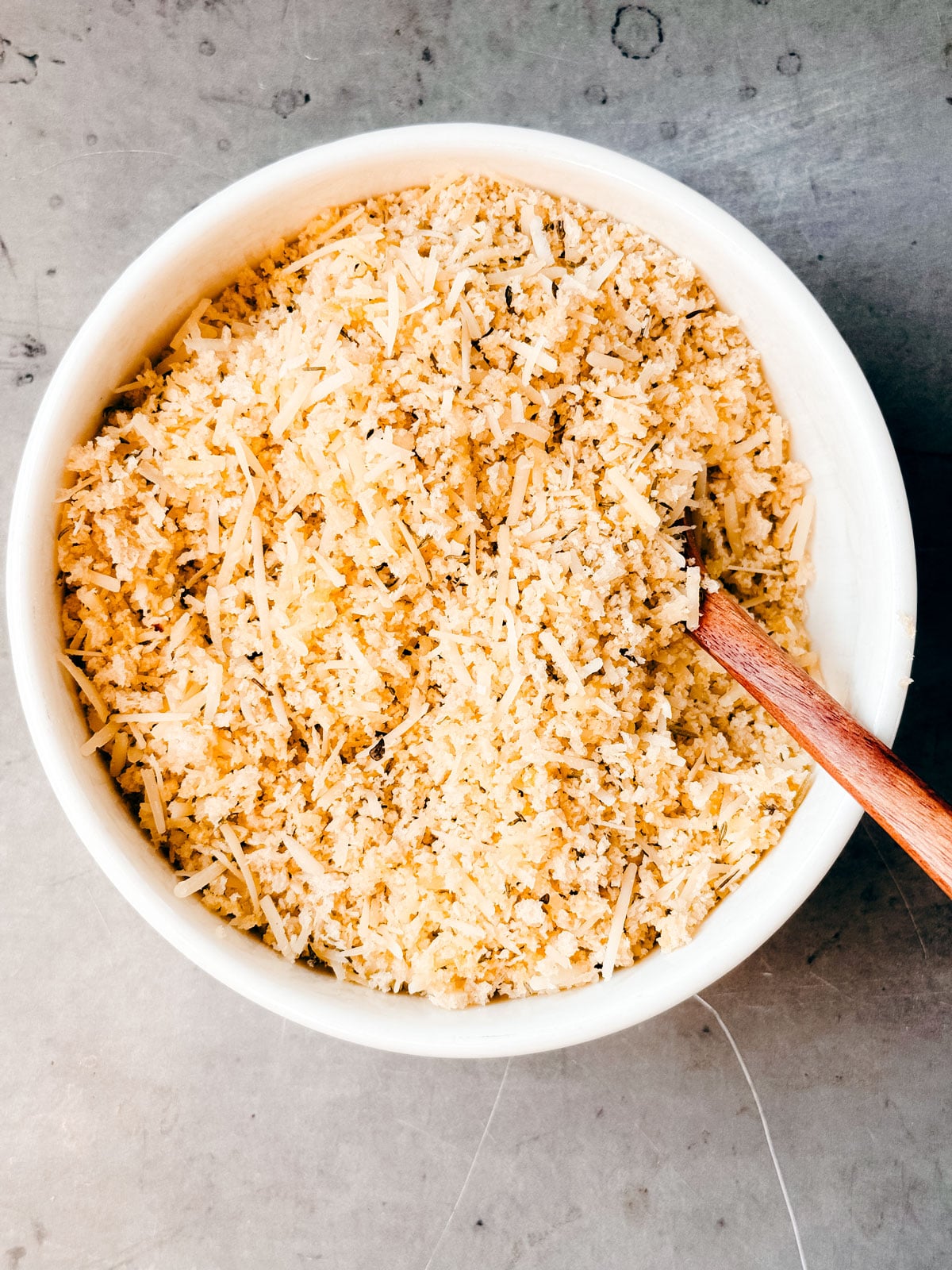 Small bowl of bread crumb and parmesan mixture.