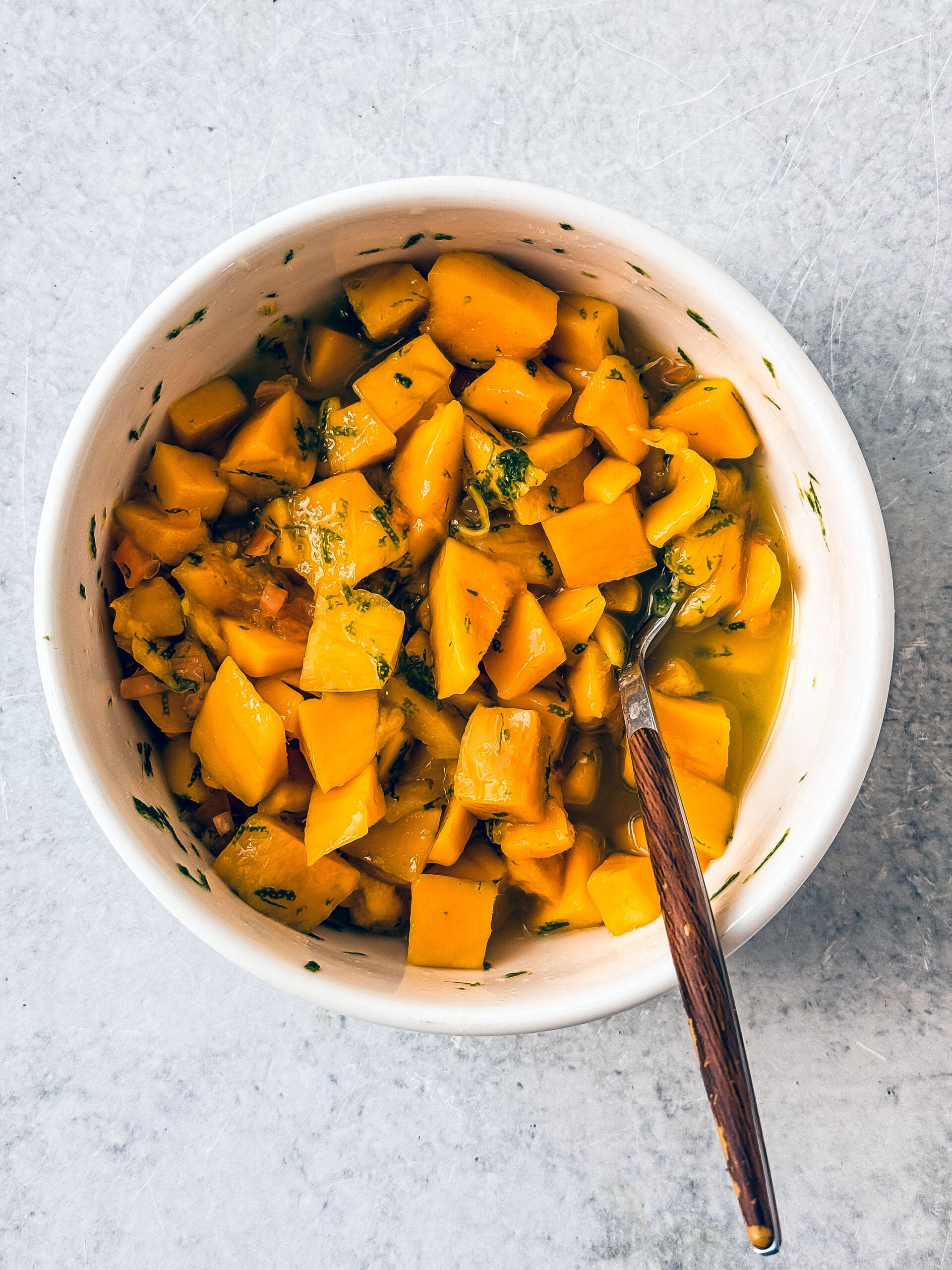 Bowl of mango salsa.