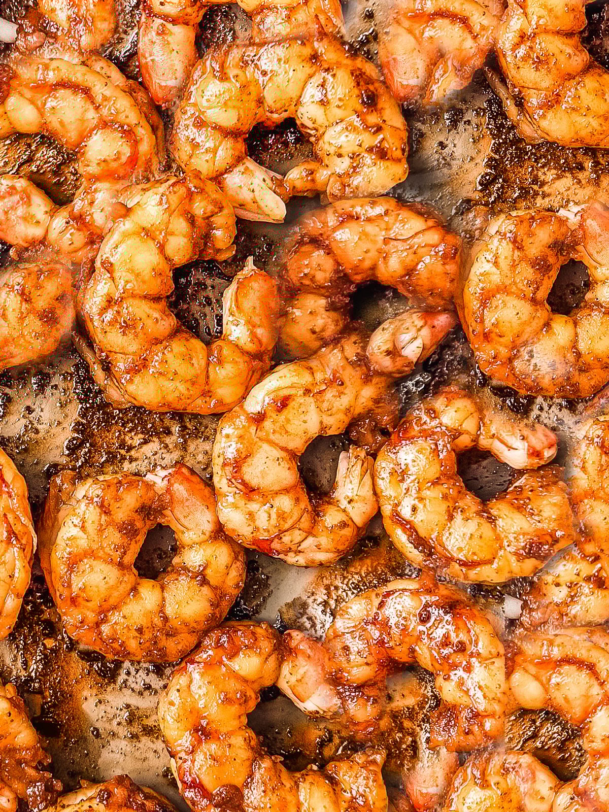 Close up of juicy pan-fried shrimp.