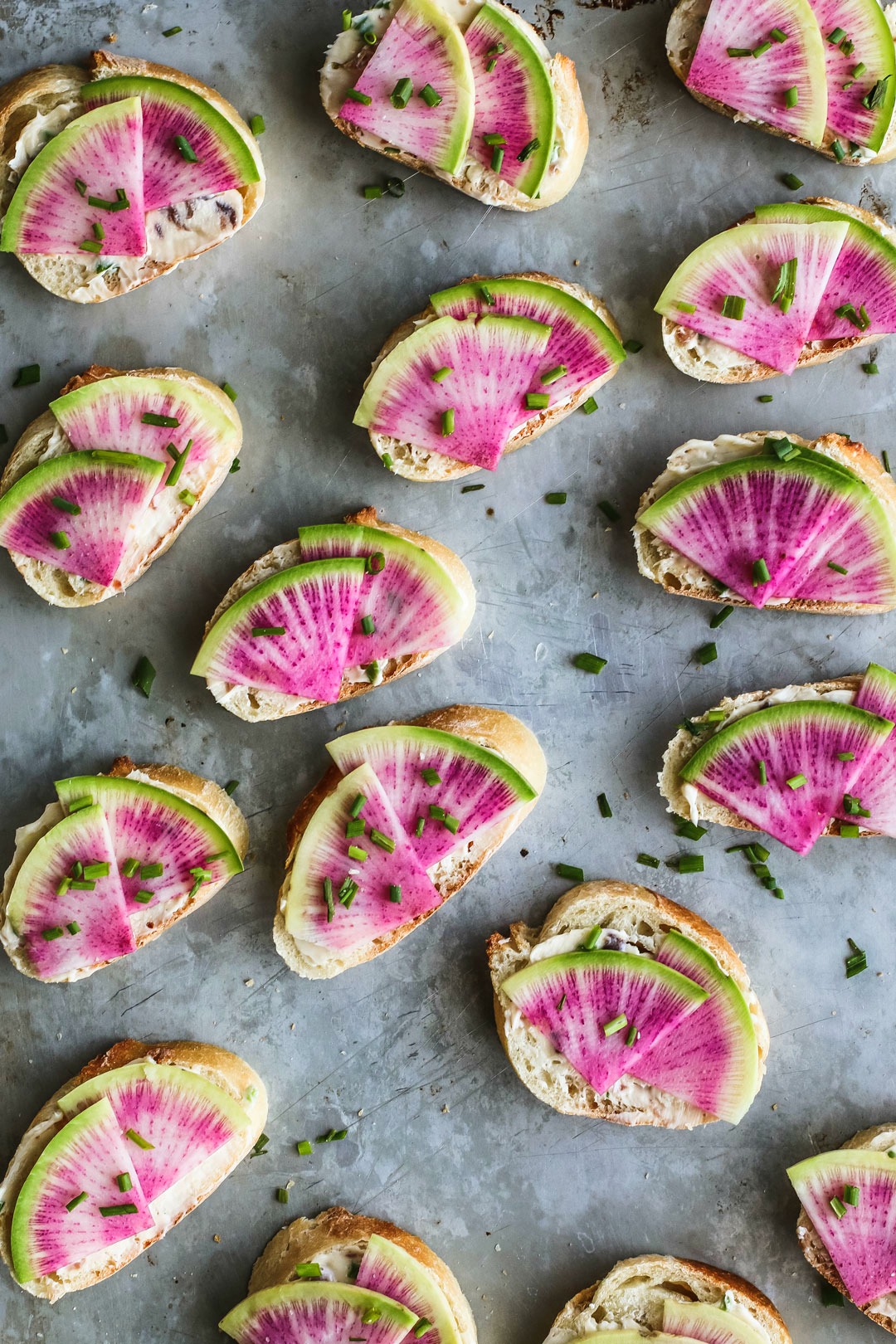 Watermelon Radishes With Anchovy Butter on Sliced Baguette | Killing Thyme
