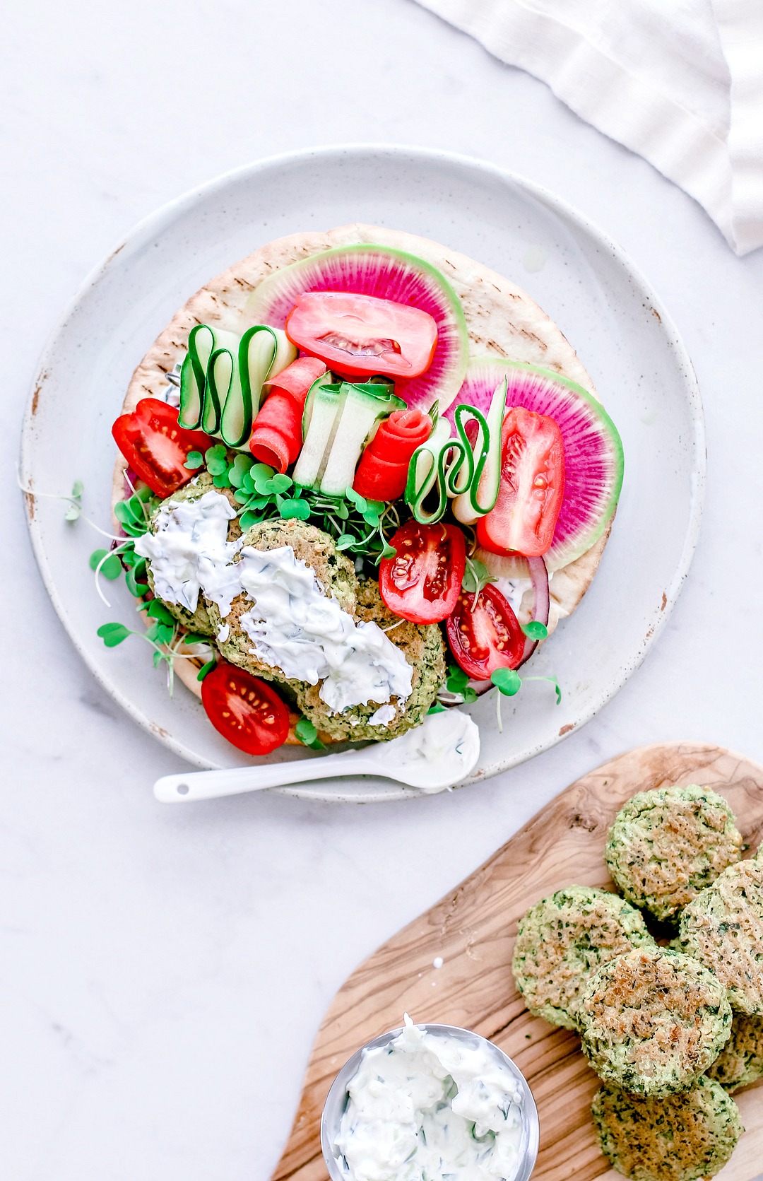 Crispy Baked Falafel With Spinach on plate