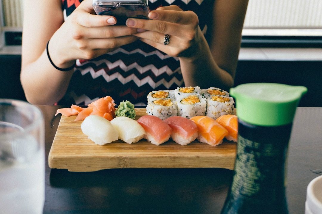 Serving board with sushi arrangement.