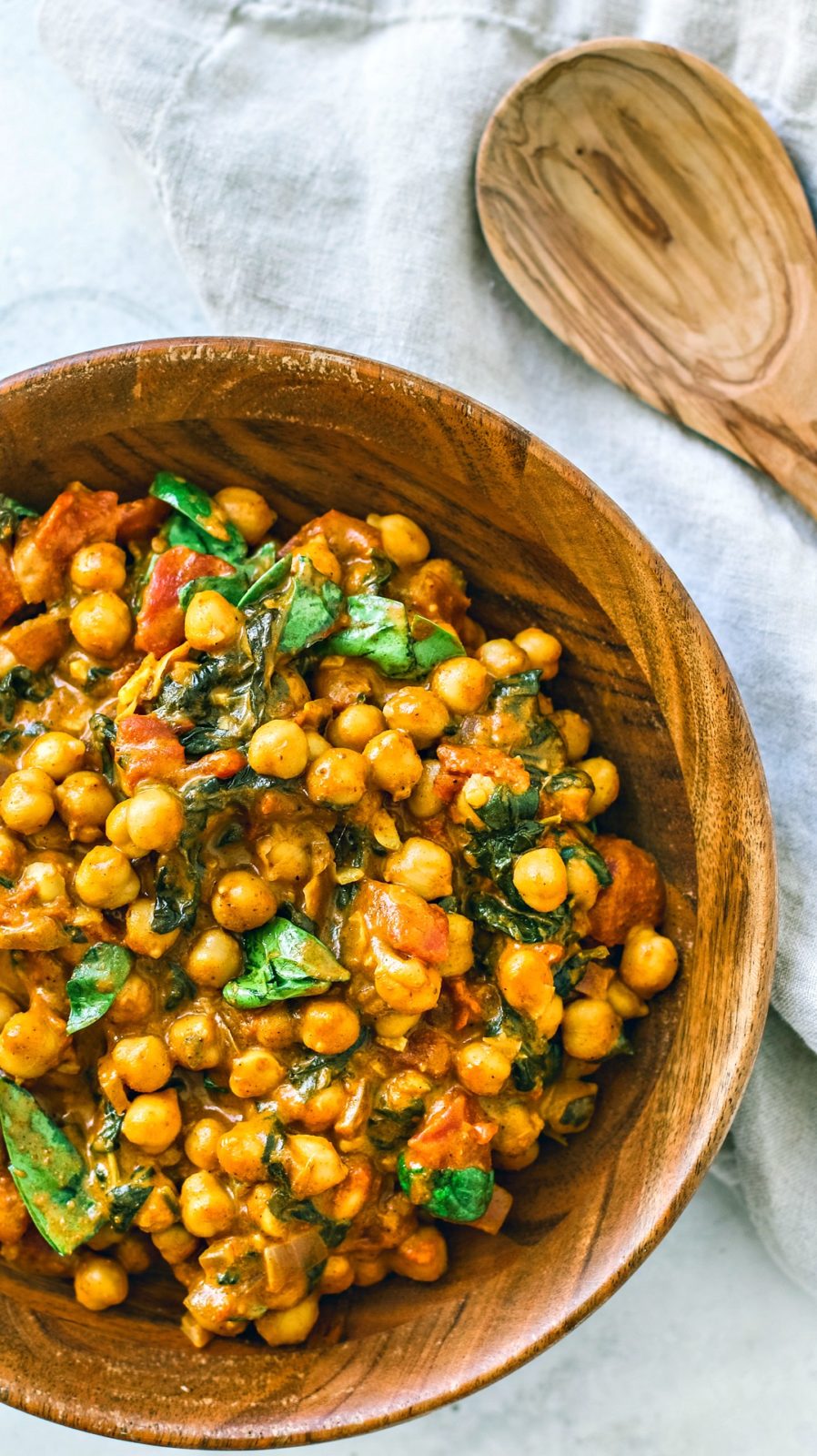 Bamboo bowl of Vegetarian Chickpea Curry.