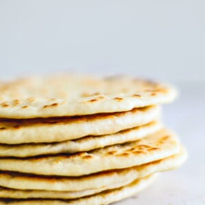 Stack of homemade flour tortillas.