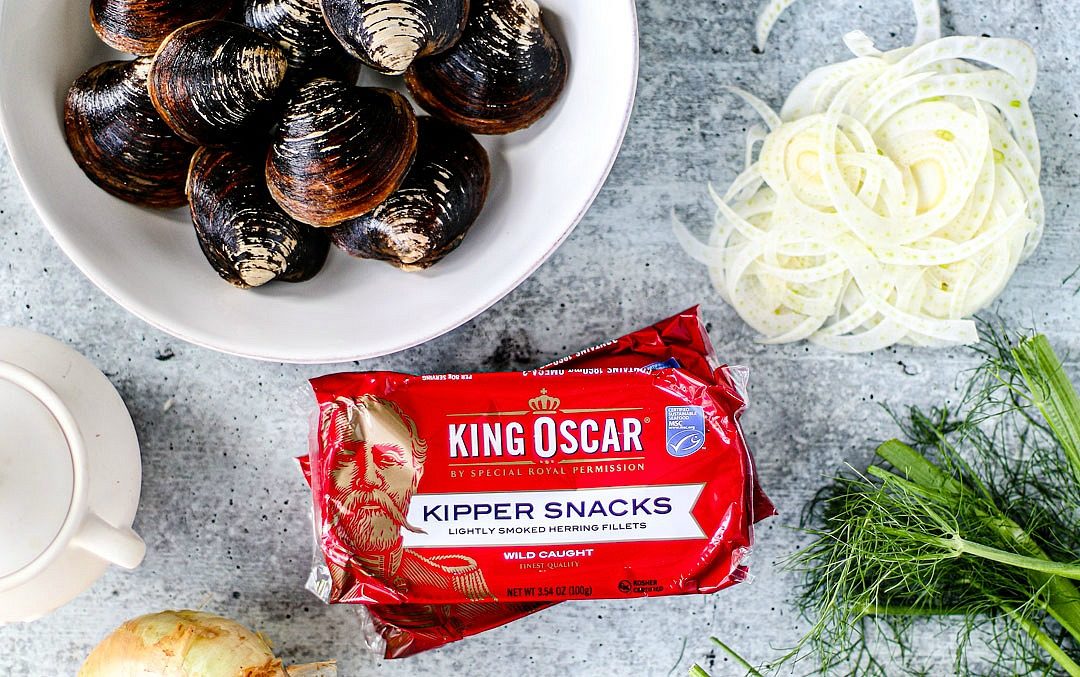 Package of King Oscar Kipper Snacks next to other ingredients.