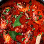 Boneless chicken cacciatore close up in pan.