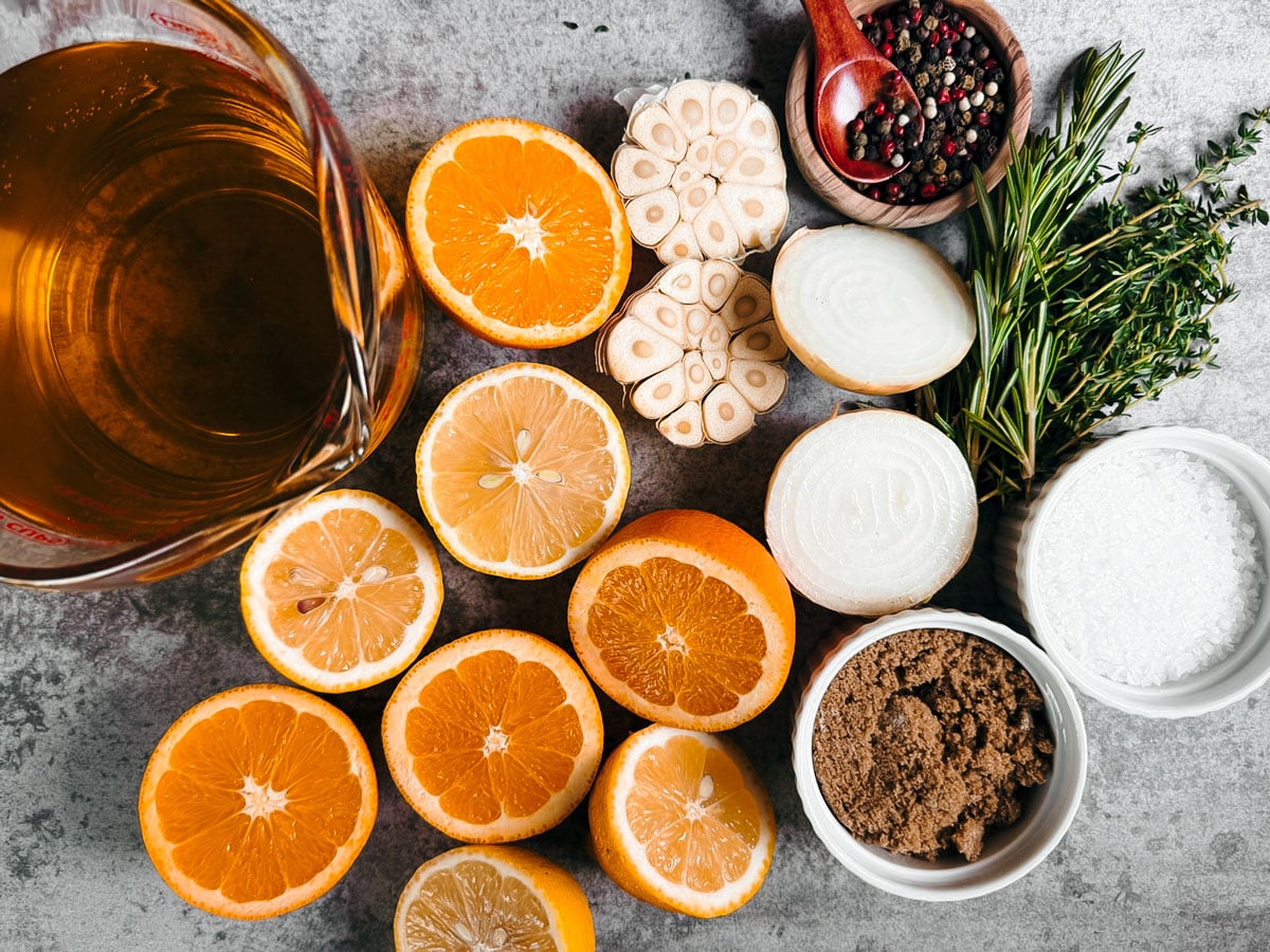 Ingredients for turkey brine on gray stone background.