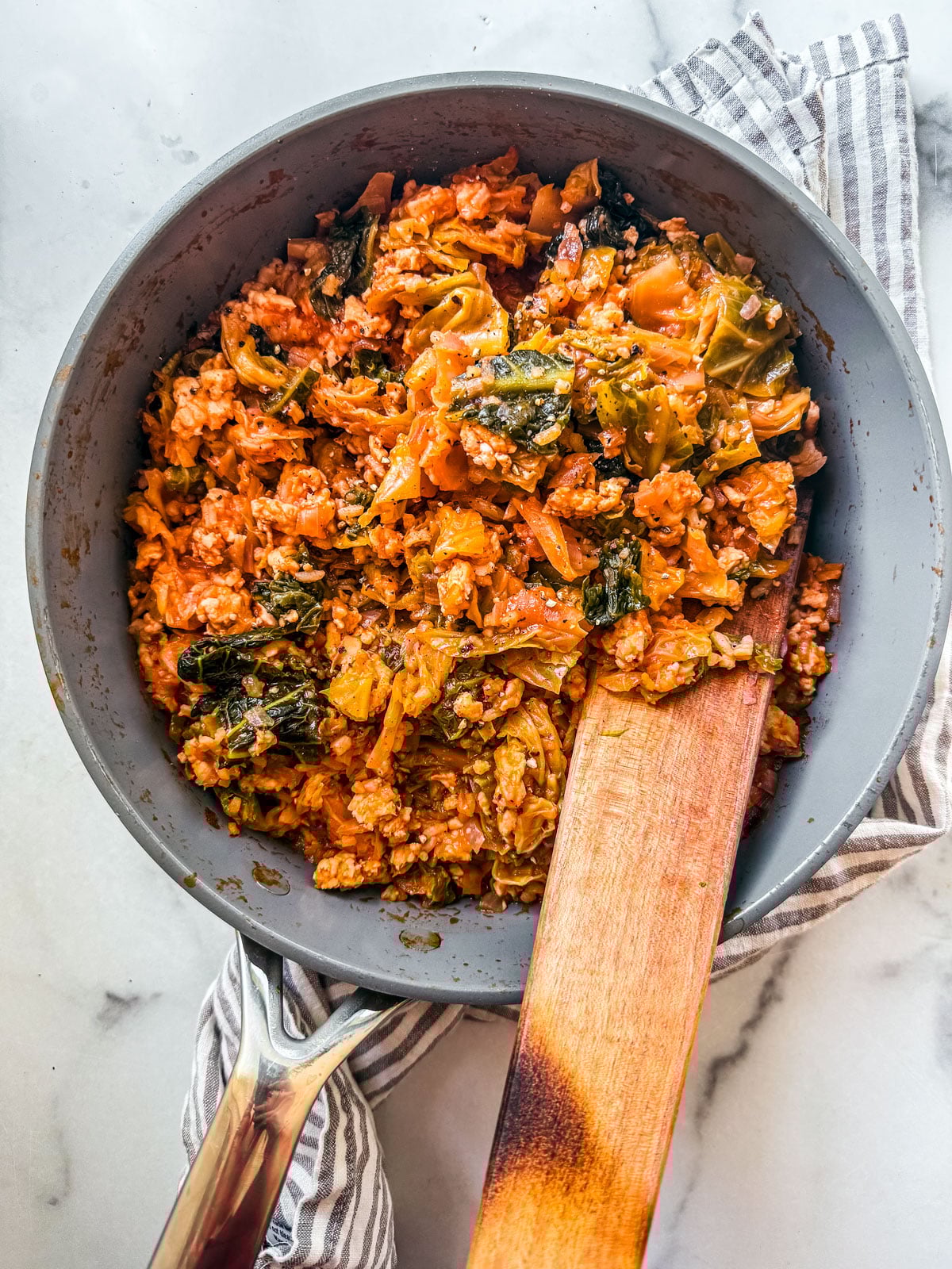 Finished unstuffed cabbage rolls in a pan.