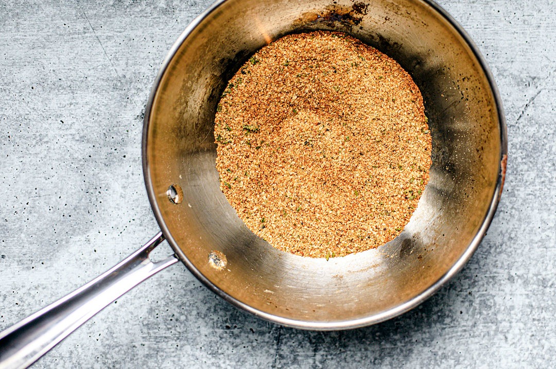 Pan full of toasted breadcrumbs.