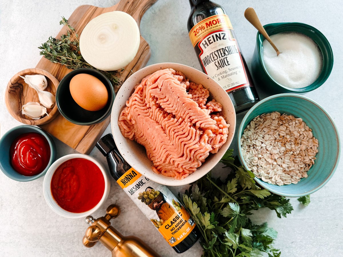 Ingredients for ground turkey meatloaf on a white background.