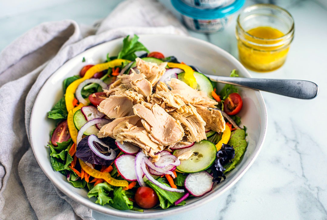 Side shot of Seasonal Garden Salad with Tuna.