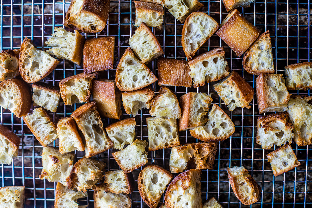 Toasted chunks of fresh bread out of the oven.