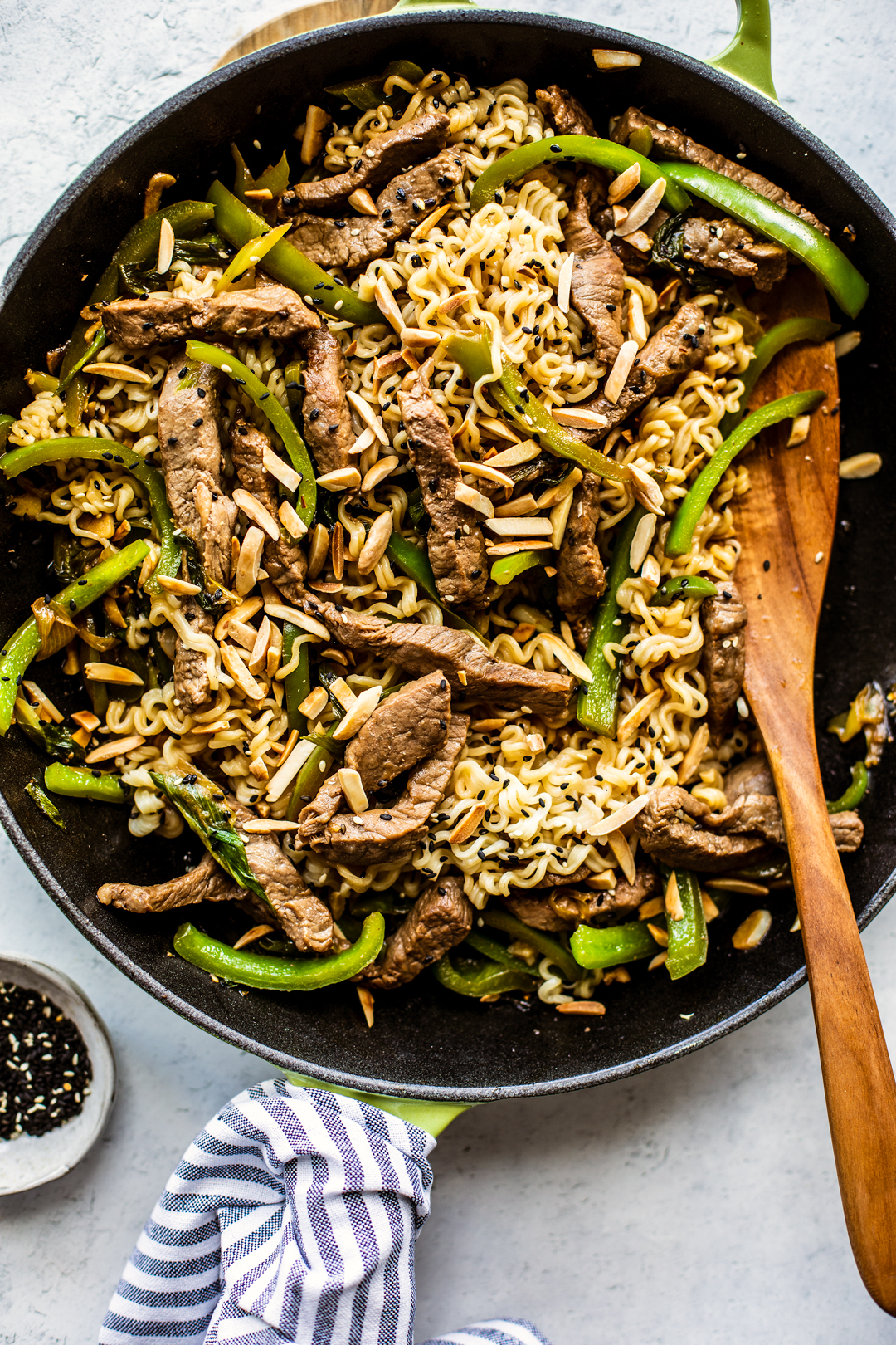 Skillet full of beef, peppers, and Ramen noodles.