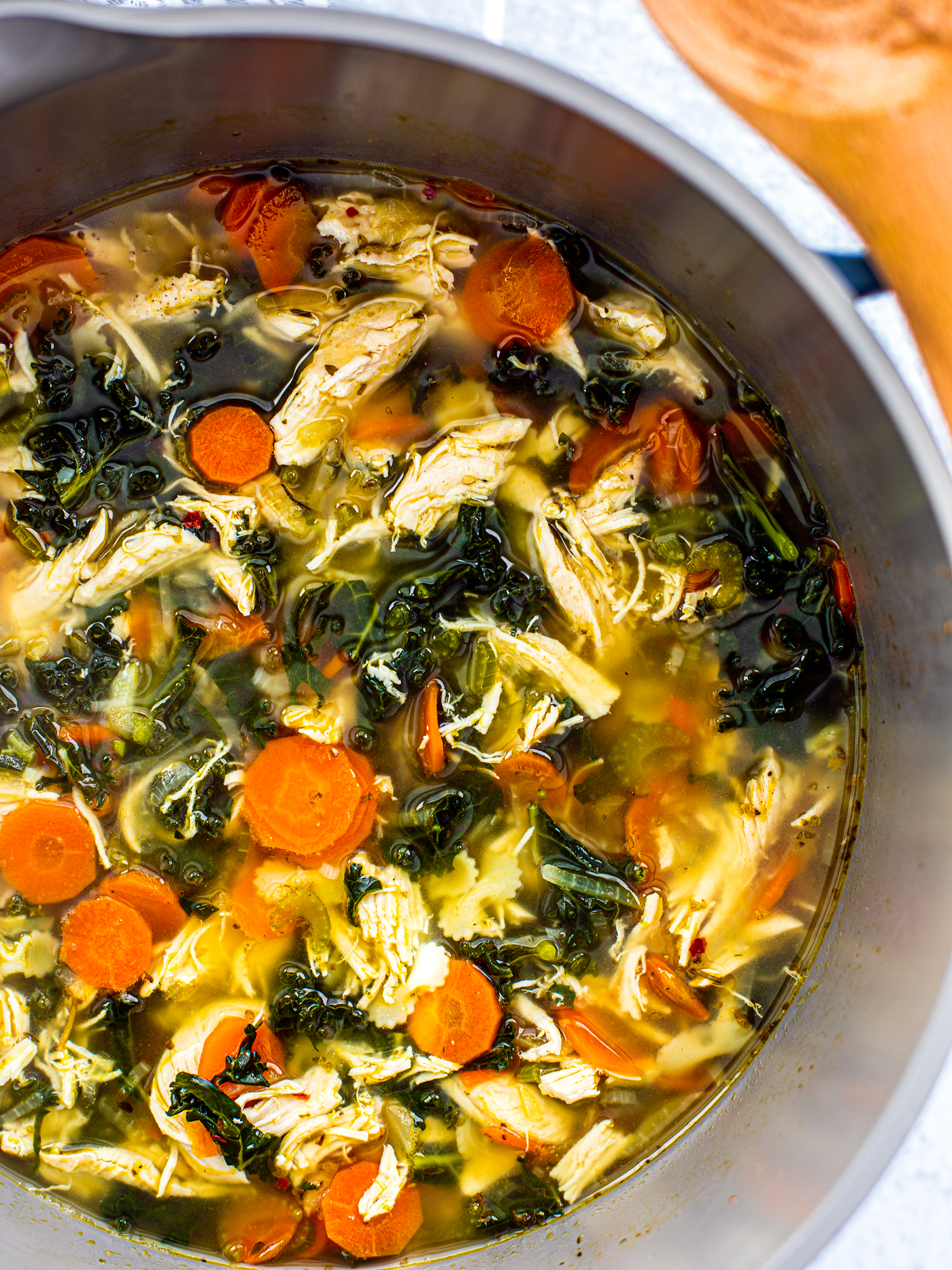 Close up of pot of chicken soup.