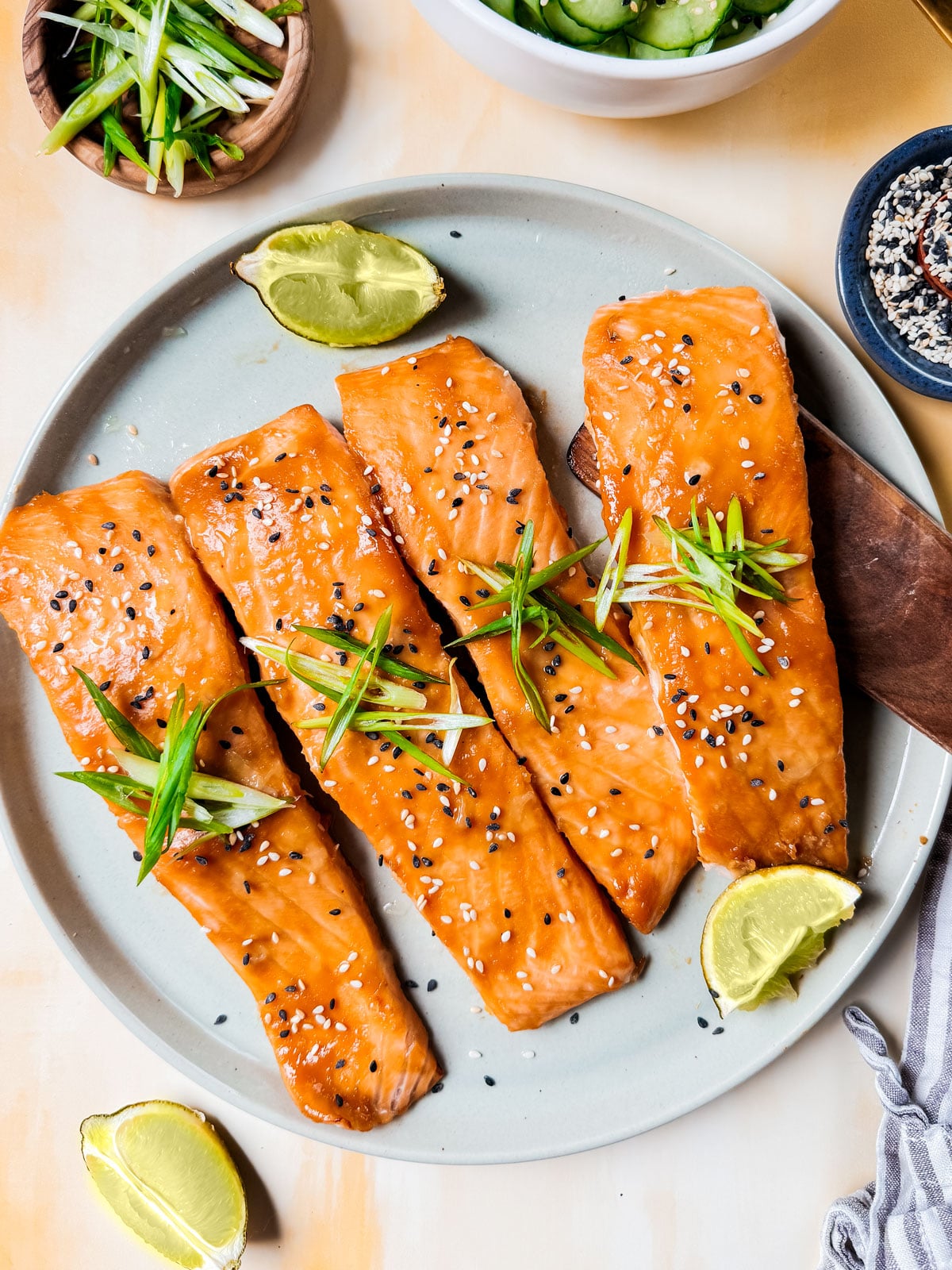 Baked Miso Salmon on serving platter with limes.