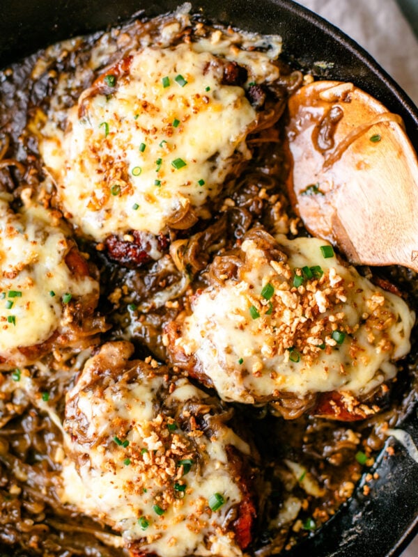 French onion pork chops in a skillet.