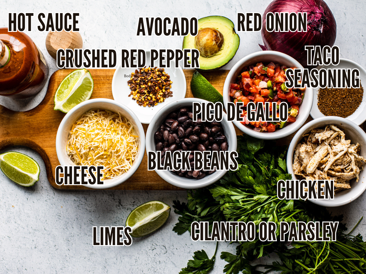 Ingredients for a burrito bowl on a light background, labelled.
