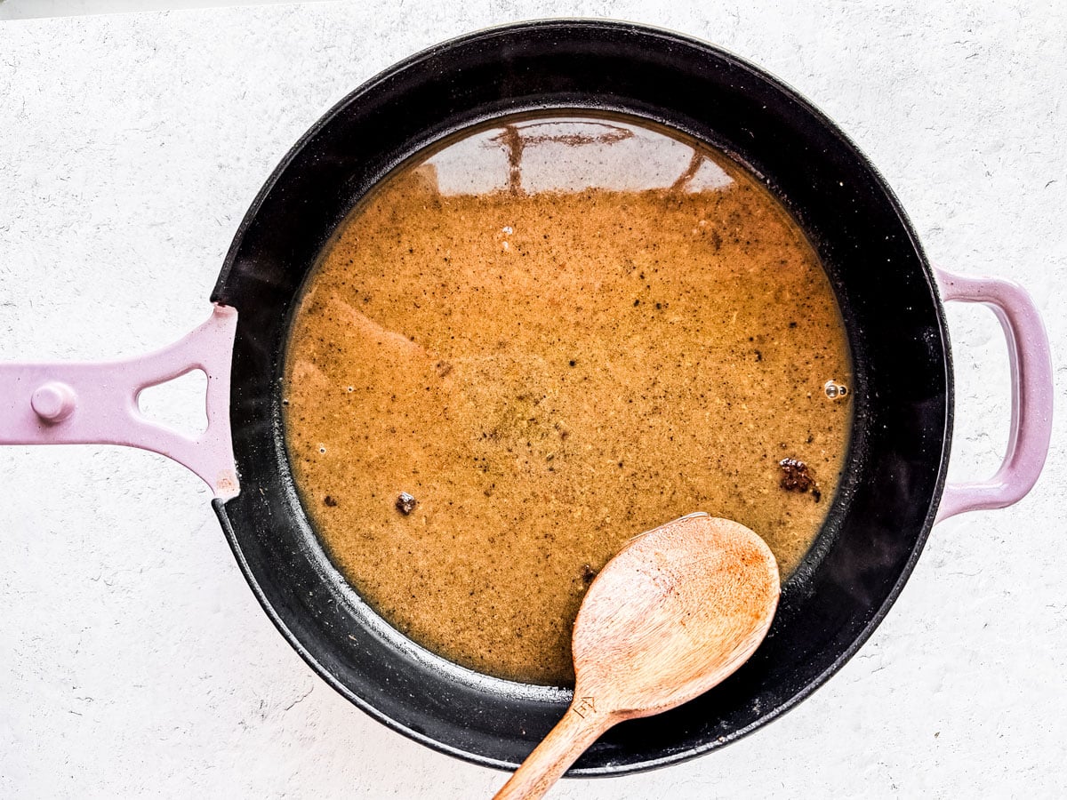 Skillet with pan sauce.