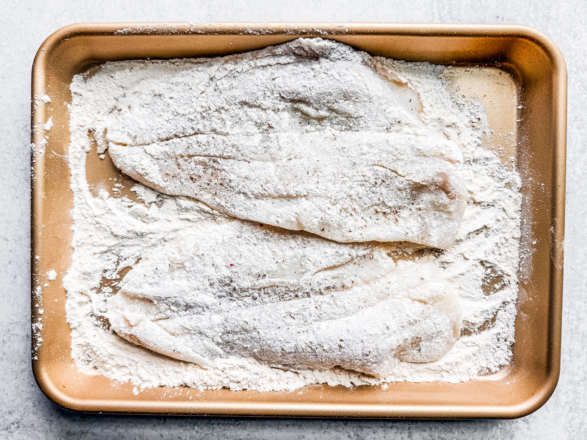 Flounder fillets dredged in flour.