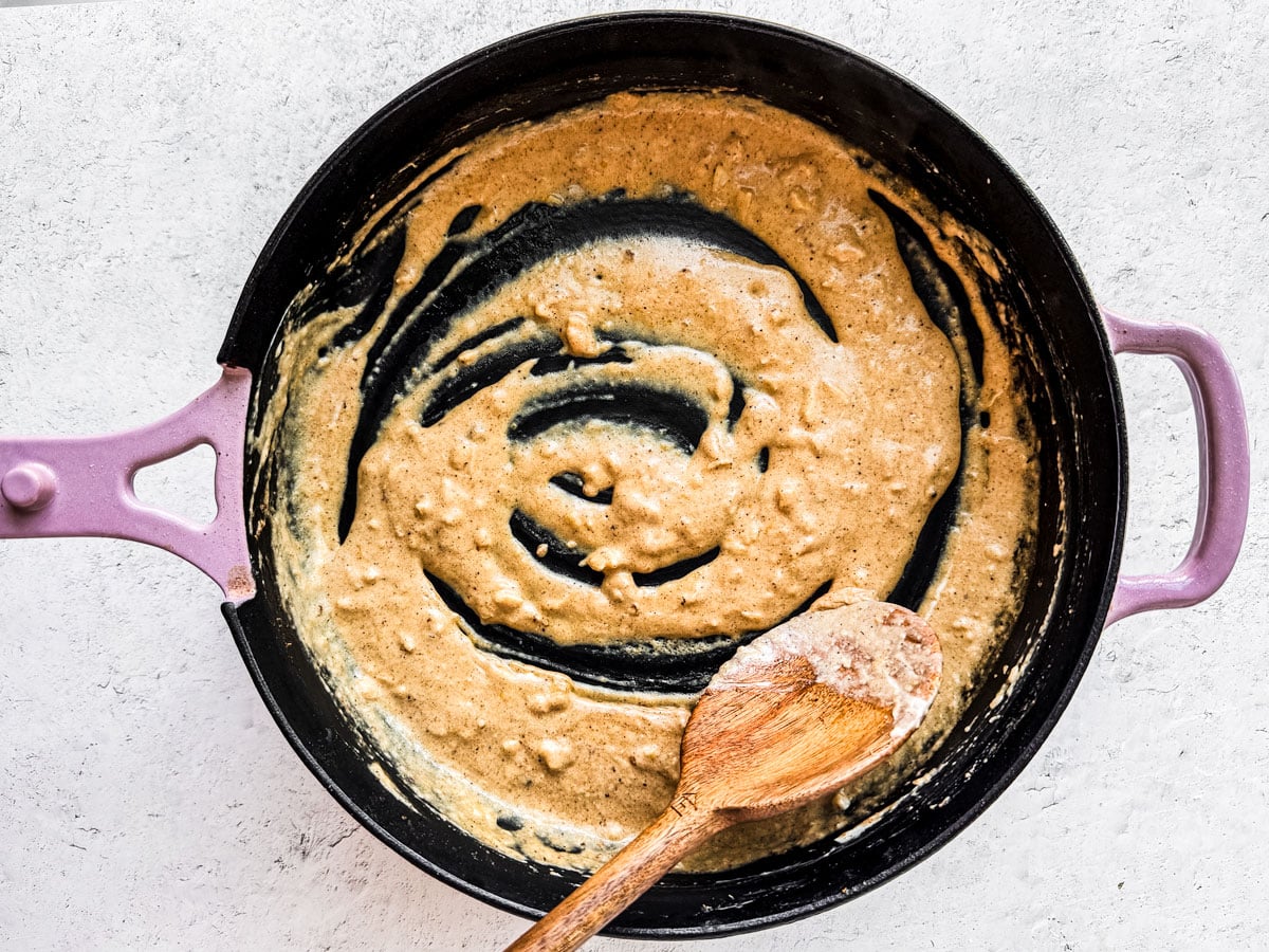 Melted cheese sauce in the pan.