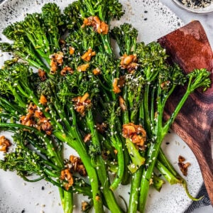Garlic ginger sautéed broccolini on a serving platter.