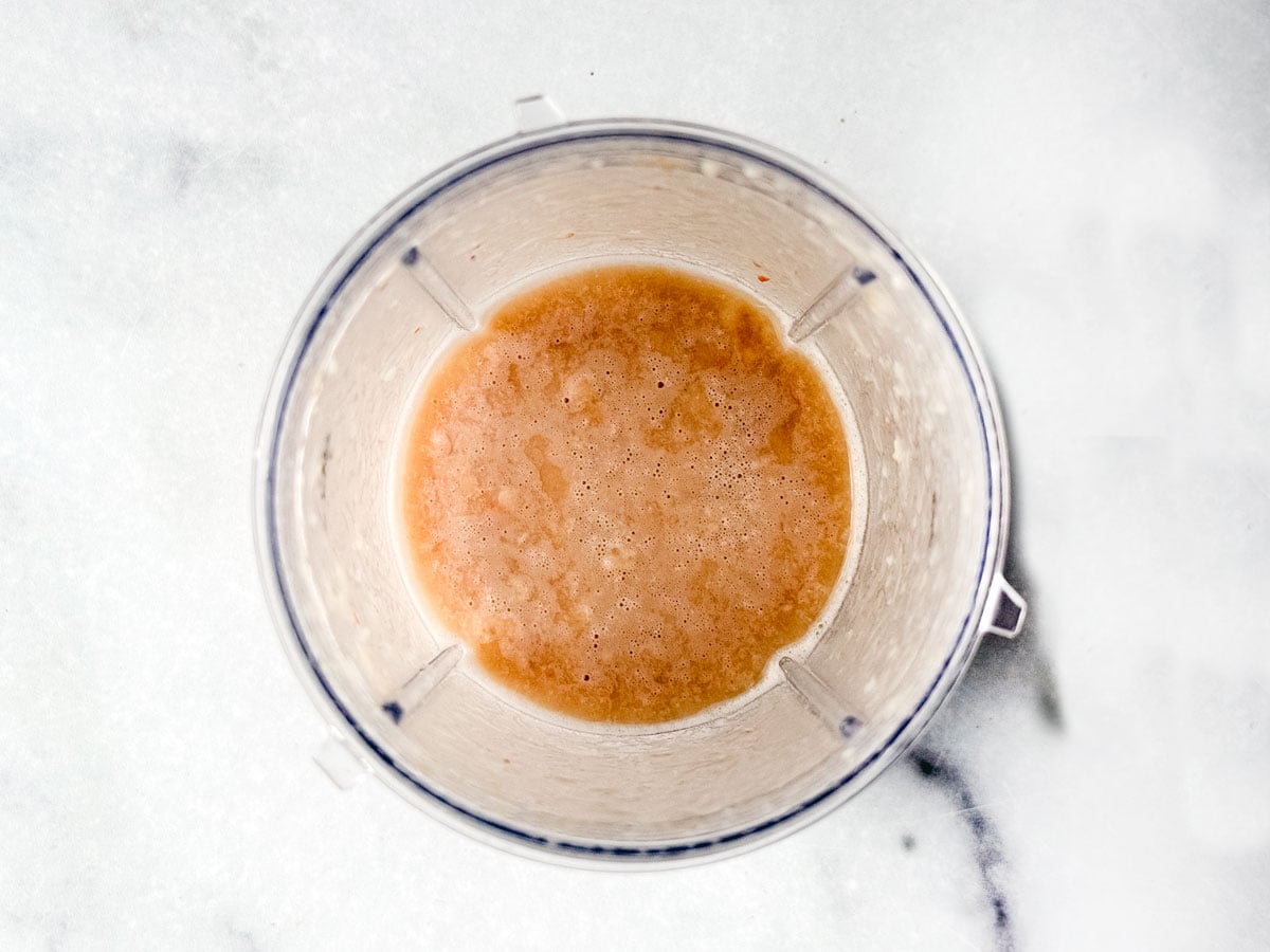 Small blender of pureed bean blend.