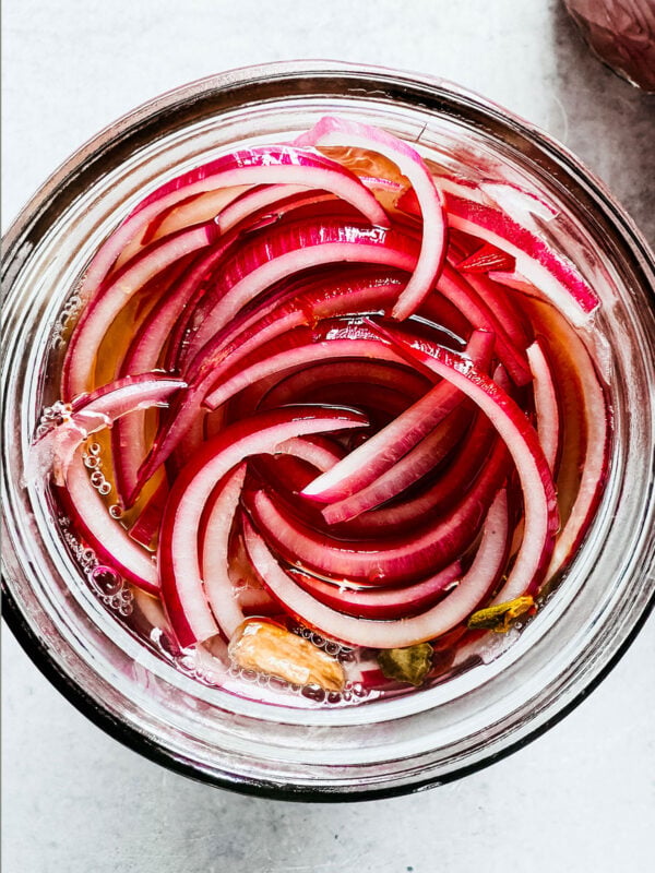 Quick-pickled red onions.